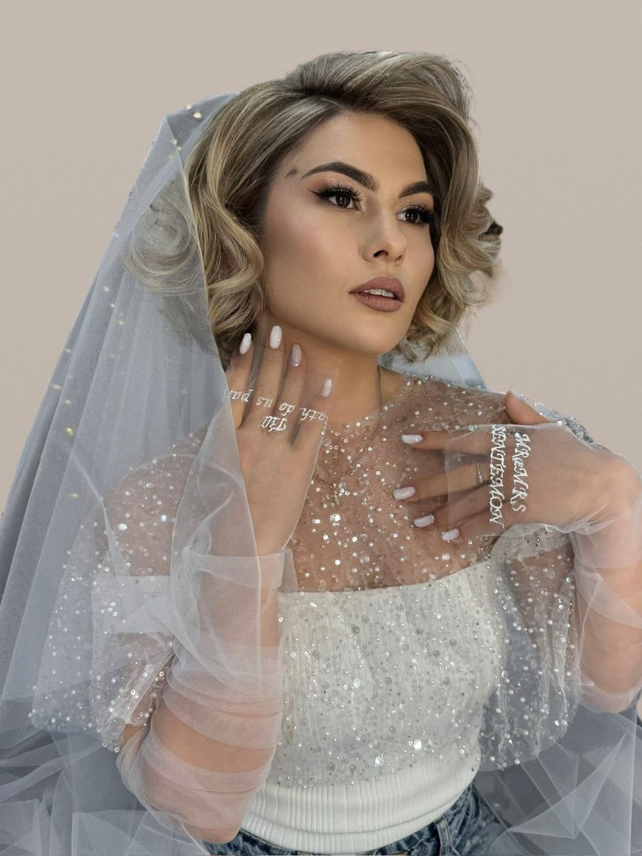 Coafură de mireasă cu valuri scurte și voal, pe blond cenușiu — lucrare realizată în salonul Inga Florea
